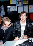 Bruce & Mark signing a poster for me and laughing